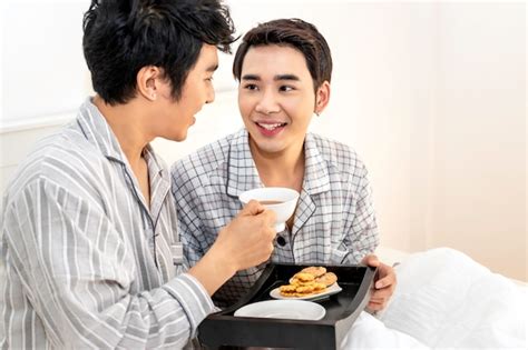 Premium Photo Asian Homosexual Couple In Pajamas Having A Breakfast In The Bed Concept Lgbt Gay