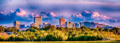 The City Of Midland In Front Of A Blue Sky Midland Splendor By Bob