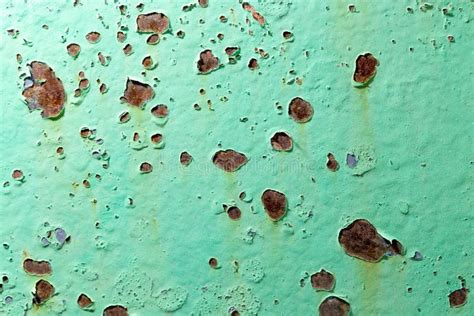 Cracked Green Paint On Rusty Metal As Abstract Background Stock Photo