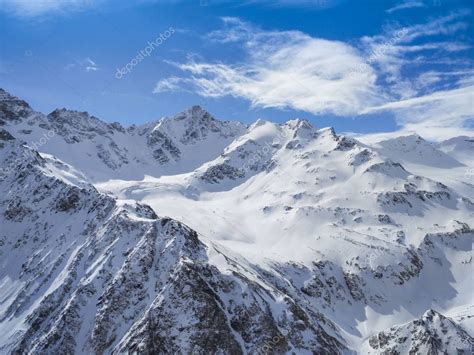 Snow Covered Mountain Slopes — Stock Photo © Smarfik 144720617