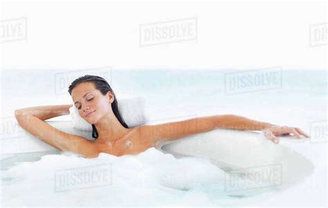 Woman Relaxing In Bathtub Stock Photo Dissolve