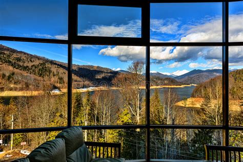 Picture Window With A View Of Mountain Lake Stock Image