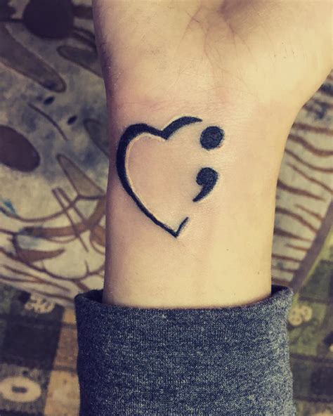 23 Black Heart Tattoo On Wrist