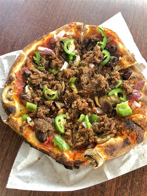 Made a beyond pizza, beyond beef, bell pepper, red onion, mushroom