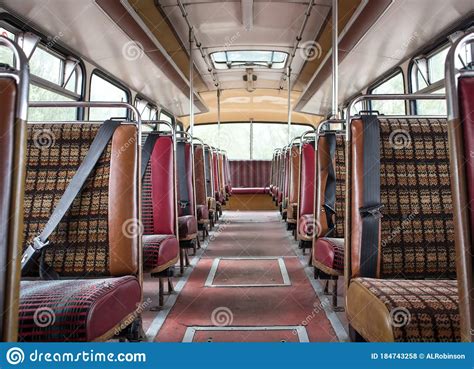 Interior Inside Of Old Classic Vintage Bus Showing Isle Seating And