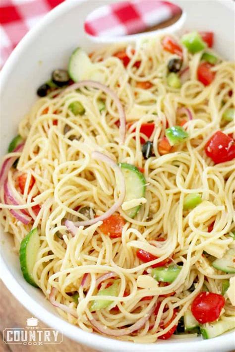 I used this recipe to feed over 100 people and it went over fabulously. SUMMER SPAGHETTI SALAD (+Video) | The Country Cook