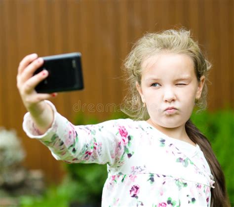 girl having fun taking selfie stock image image of female drawing 76915935