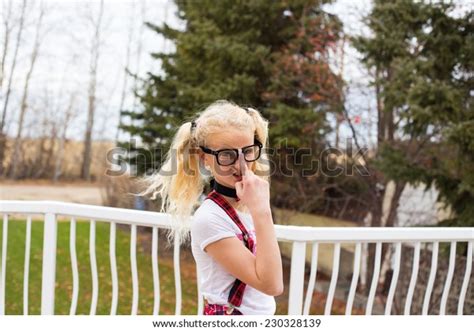 Young Nerd Girl Pigtails Pushing Her Stock Photo Edit Now 230328139