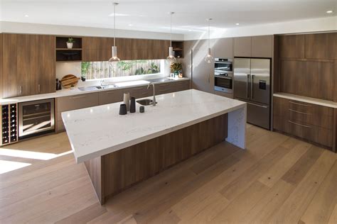Large Modern Contemporary Kitchen In Warm Tones With A Huge Island