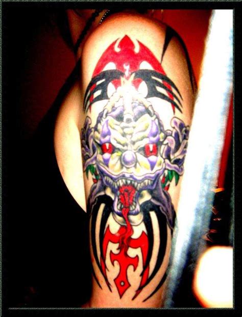 The problem is that most people don't want a tribal tattoo for its. Tribal evil clown arm tat tattoo