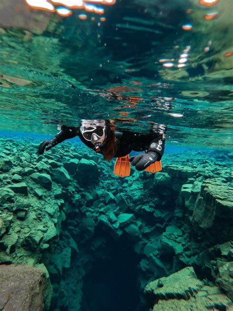 Swim Between Two Tectonic Plates Snorkeling In Silfra Iceland Roving Rainbow