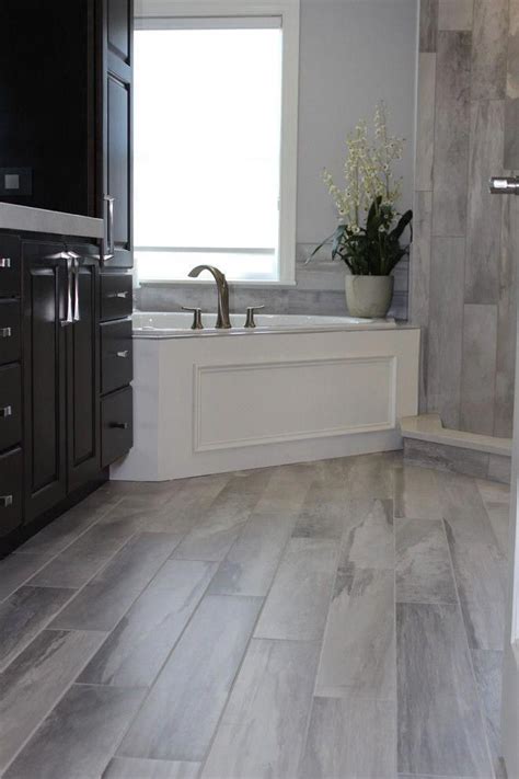 Discover inspiration to makeover your space with audrey hall example of a trendy bathroom design in other slate floor with inset wood slats to drain. Lowes Bathroom Floor Tiles Tile Design Ideas #bathroomtile ...