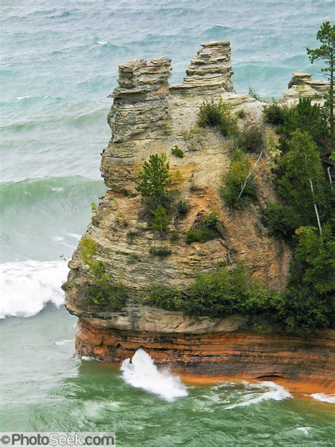 Waves Of Lake Superior Cut A Hole In The Sedimentary Rock Of Miners