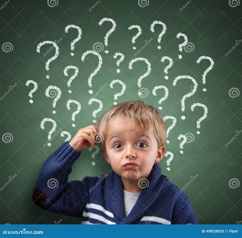 Child Thinking With Question Mark On Blackboard Stock Photo Image