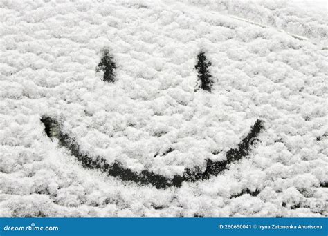 Winter Decoration Smiley Face On A Snowy Car Window Hearty