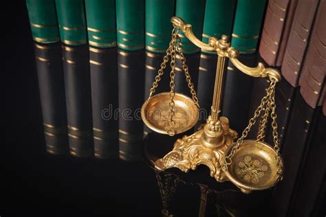 Golden Justice Scales In Front Of Law Books Stock Image Image Of