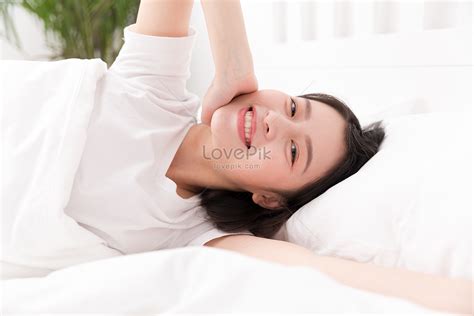 A Young Woman Who Wakes Up In Bed Picture And Hd Photos Free Download