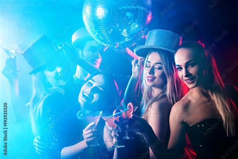 Dance Party With Group People Dancing Women And Men Have Fun In Night Club With Disco Ball On