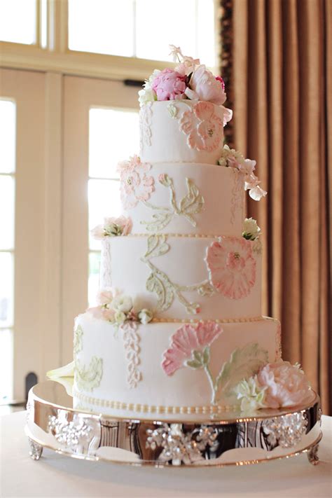 Ahead, you'll find plenty of gorgeous wedding cakes with flowers and confections topped with citrus, berries, gorgeous. Classic Wedding Cake With Pink and Green Icing Flowers ...