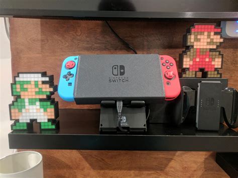 Nintendo Switch Docked With A Usb C Cord Powered To The Dock Always