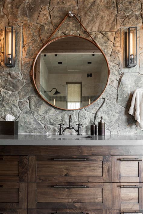 Here, your favorite looks cost less than you thought possible. Wooden Vanity With Round Mirror in Master Bathroom | HGTV