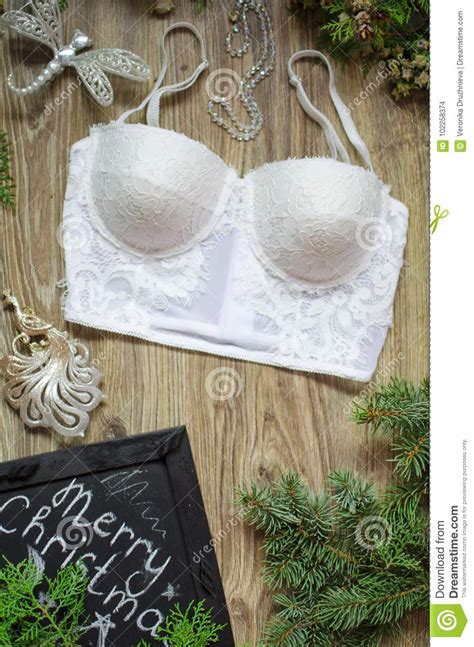 fashion push up bra and panties set on the wooden festive background merry christmas t for