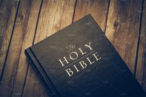 213 reads 19 votes 3 part story. The Holy Bible on a wooden table ~ Photos ~ Creative Market