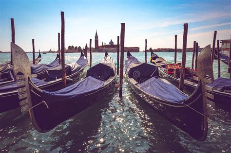 Venetian Gondolas And San Giorgio Maggiore Island In Venice Italy