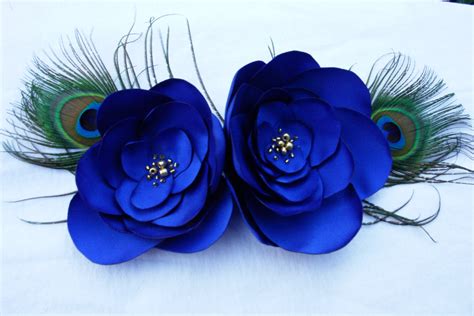 They all have high quality and reasonable price. Peacock Feather Flower Fascinator Royal Blue Satin Fabric