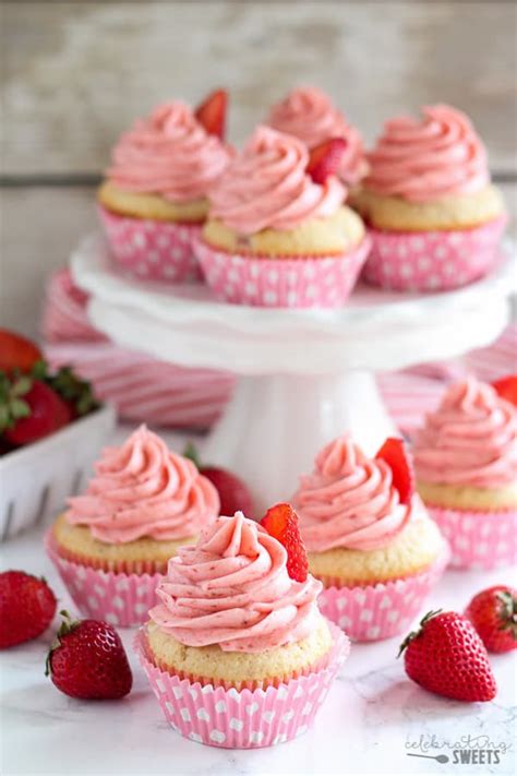fresh strawberry cupcakes made from scratch and topped with strawberry frosting