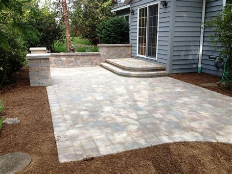 Backyard stone patio design ideas dry laid flagstone cost. Grow Rite design - Patio & walkway are Unilock - Brussels ...