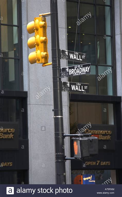 New York Traffic Light And Street Signs Wall Street And Broadway Stock