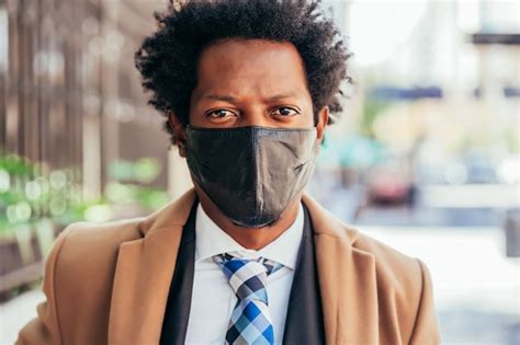 Premium Photo Businessman Wearing Face Mask While Standing Outdoors