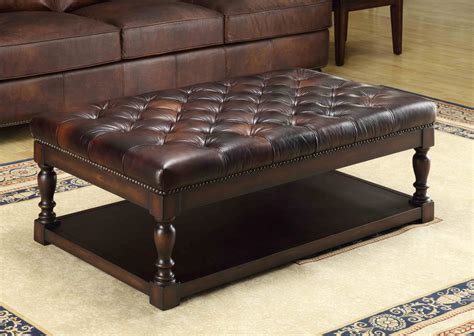It features a square shape with storage. Ginney Toberlone Leather Tufted Shelf Cocktail Table from ...
