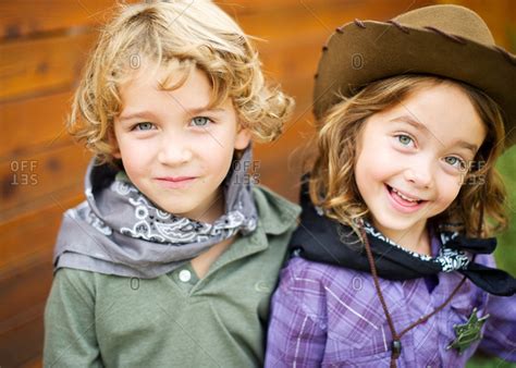 Portrait Of Fraternal Twins In Western Costume Stock Photo Offset