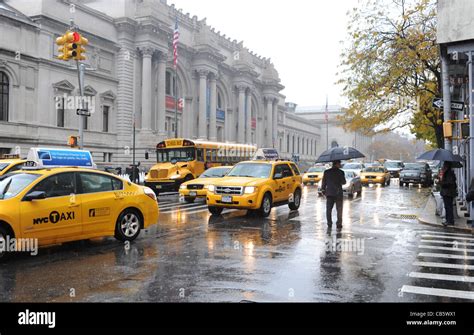 Yellow Taxi Cabs Pass The Metropolitan Museum Of Art Manhattan New York