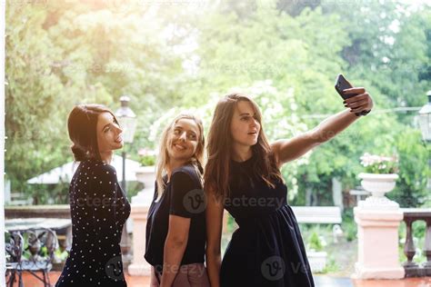 Three Girls Make Selfies 11489566 Stock Photo At Vecteezy