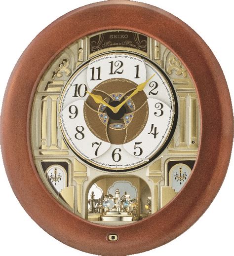 Seiko clock model re579s wave symphony musical motion wall clock wonderful decorative pendulum rocks following the music, with mirrors behind it. Retired | Seiko, Chelsea, QXM539BRH, | Springfield Clock Shop