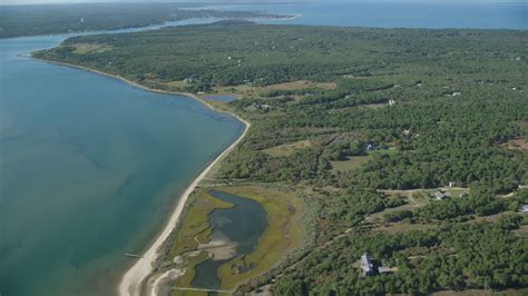 Chappaquiddick beach is a beach in massachusetts. Chappaquiddick Island, Massachusetts Aerial Stock Footage ...