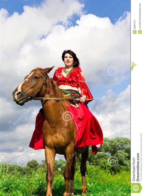 Beautiful Gypsy Girl Riding A Horse Royalty Free Stock