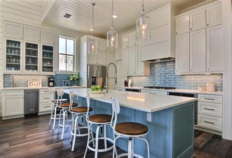 These blue kitchen cabinets come in varied designs, sure to complement your style. Butter Lutz Interiors | House of Turquoise