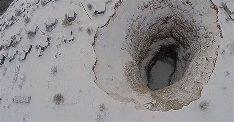 Watch Dramatic Video Of Giant Sinkhole Forming In The Middle Of City