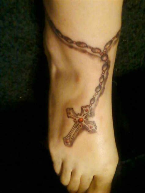 Similarly, christians believe that christian tattoos enhance their faith and also display that how proud they are of their faith. leg religious tattoo - Design of TattoosDesign of Tattoos