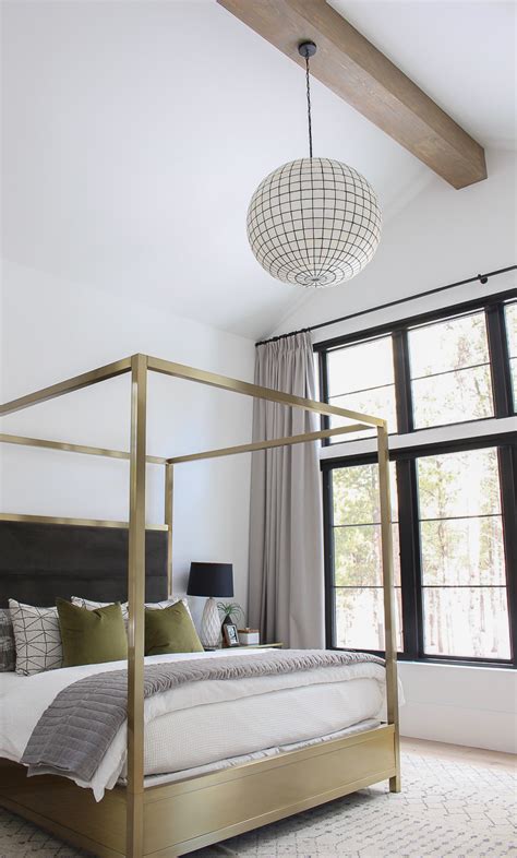 The frame is sleek and stylish, featuring curved and angled arches that come together to form an open canopy above the bed. The Forest Modern: Master Bedroom Reveal! - The House of ...
