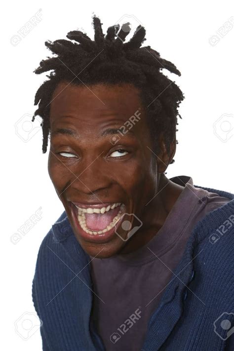 Young Black Man With Dreadlocks Hairstyle And Crazy Look On Face R