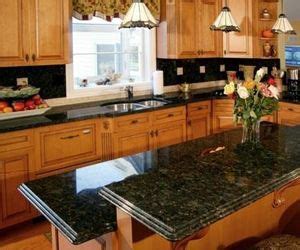 The uba tuba granite you see here is something to behold. ubatuba granite oak cabinets | Ubatuba Granite | Popular kitchen designs, Kitchen photos