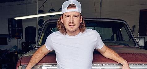 morgan wallen holds on to the top of billboard s 200 sixth week in a row falseto