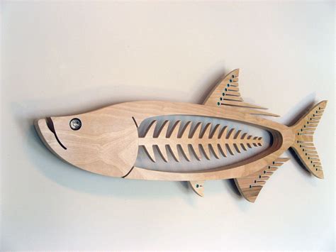 Hand planes and smaller handsaws then bring them to final, accurate dimensions. Tarpon | Fish sculpture, Wooden fish, Wood art