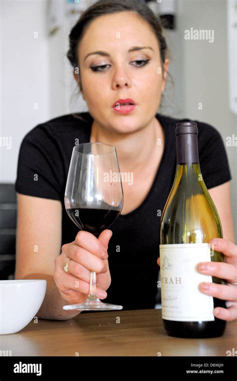 Young Woman 20s Drinking Red Wine Looking Depressed And Sad Posed By