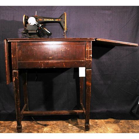 vintage singer sewing machine and table